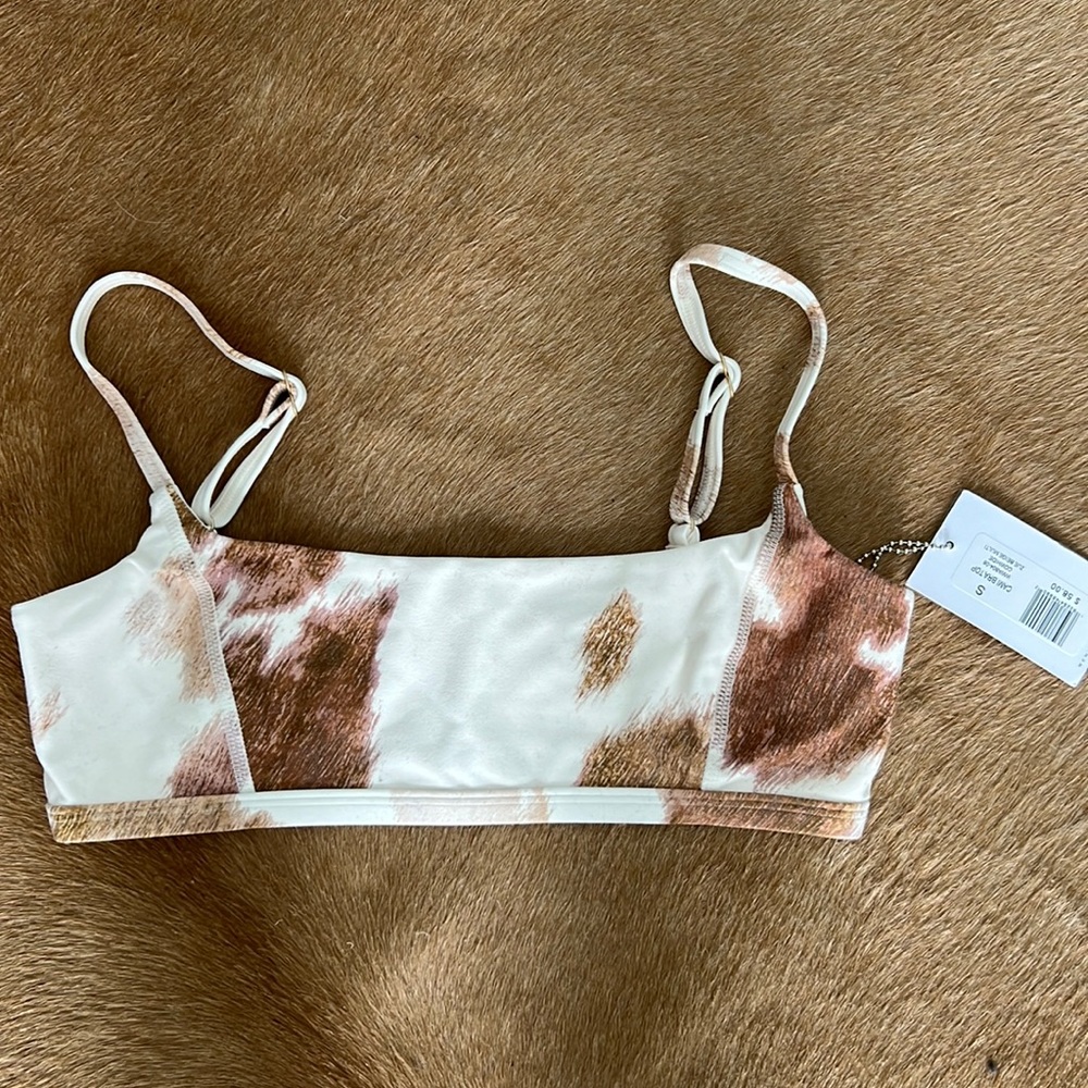 We Wore What Cow Print Sports bra